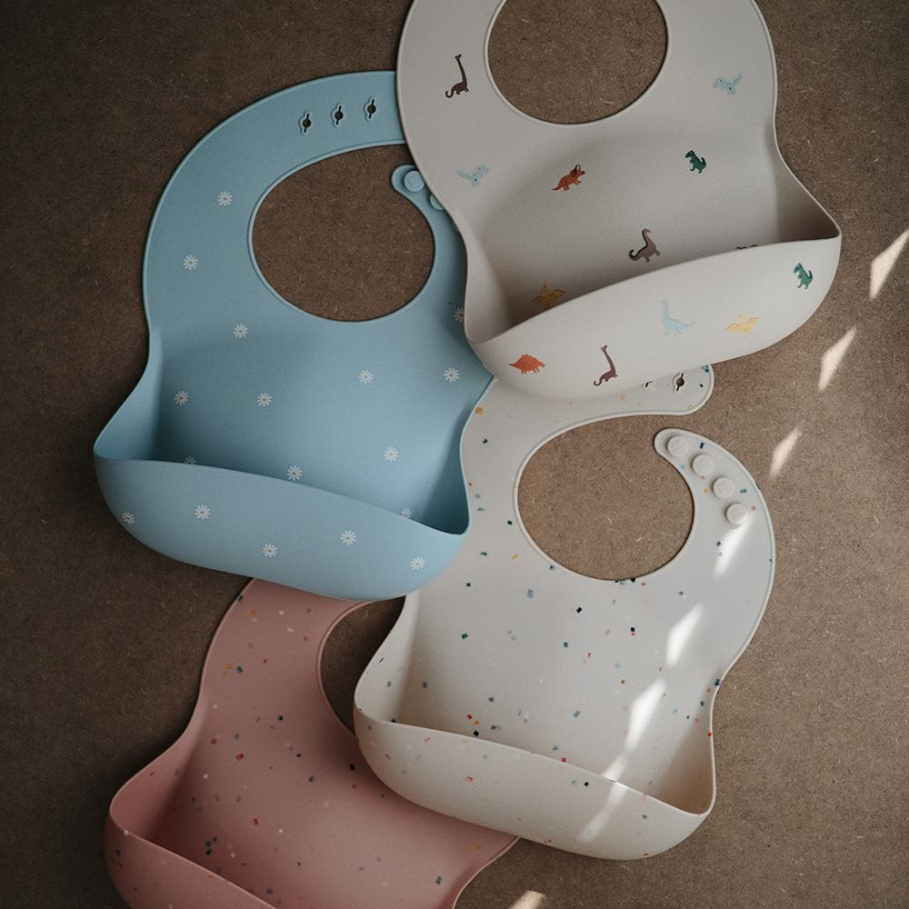 Bavaglino In Silicone Con Tasca - Dinosauri